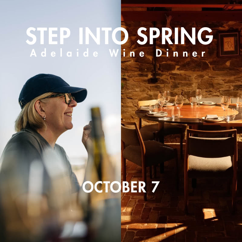 Promotional graphic for an outdoor wine dinner in Adelaide, split into two scenes: on the left, a smiling woman in a navy cap and sunglasses holds a wine bottle against a bright sky; on the right, a warmly lit dining table is set with wine glasses on a stone wall background. Large white text reads 'STEP INTO SPRING', 'Adelaide Wine Dinner', and 'OCTOBER 7'.